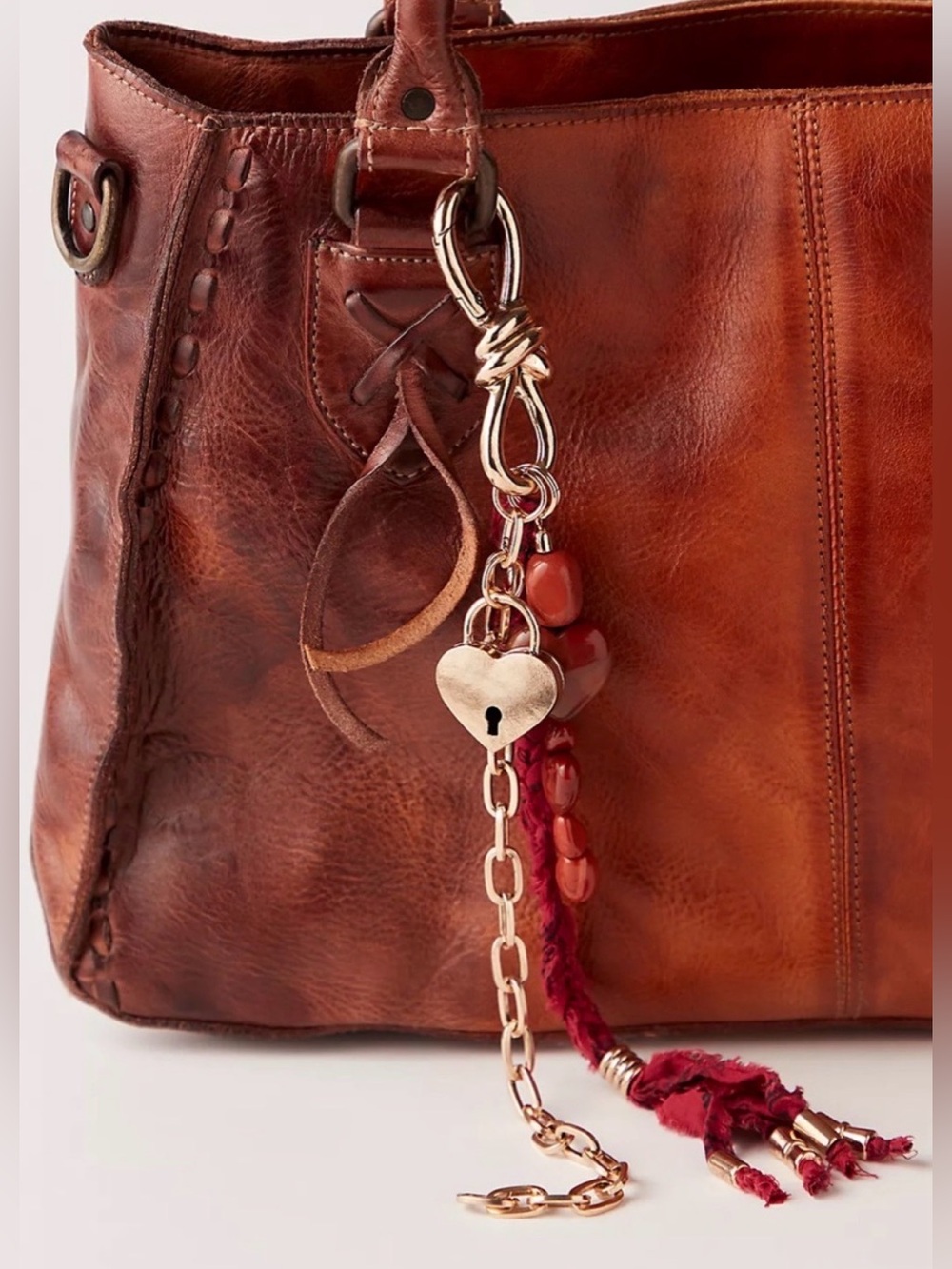 Free People Semi Precious Charmed Strand Bag Charm- burnt red🔥
